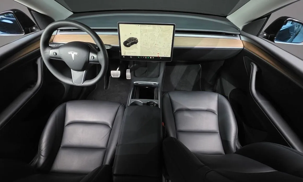 Tesla Model Y — фото 8