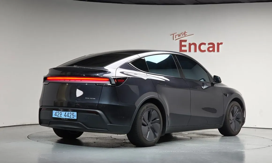Tesla Model Y — фото 7