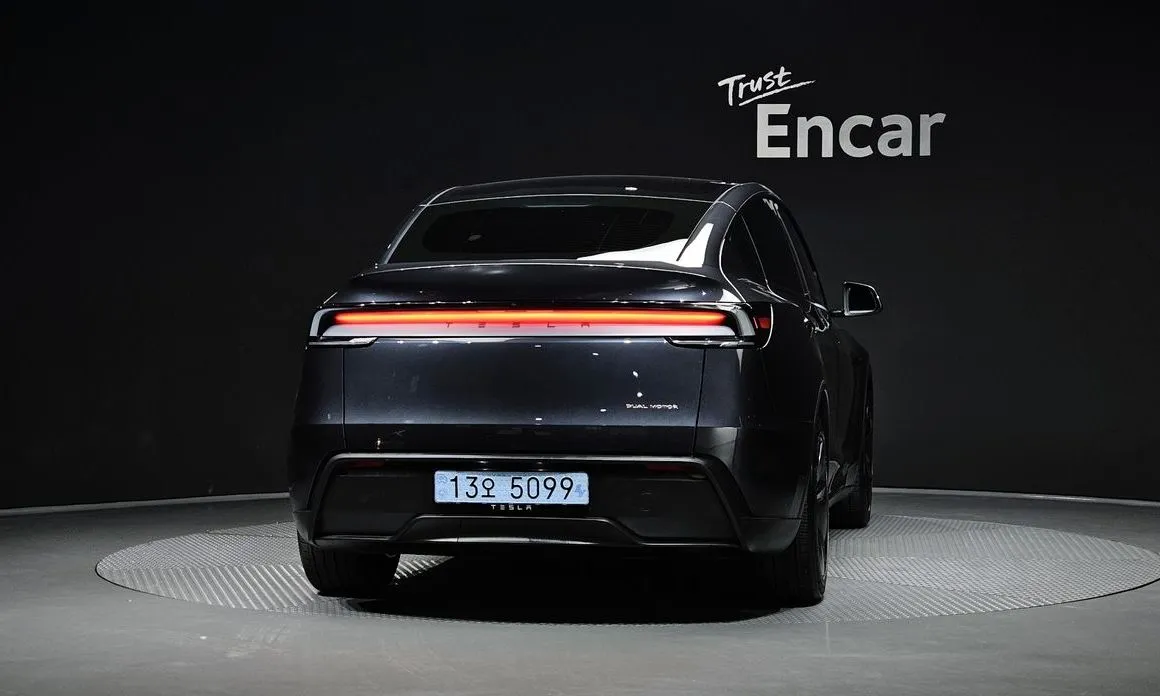 Tesla Model Y — фото 7