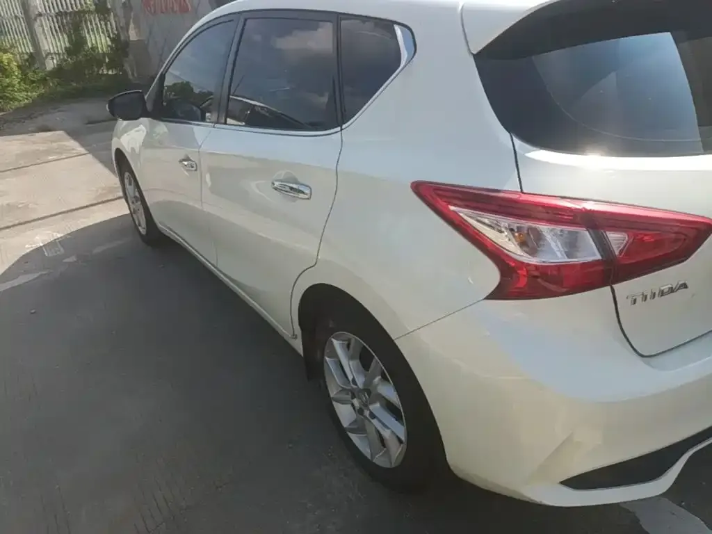 Nissan Tiida — фото 8
