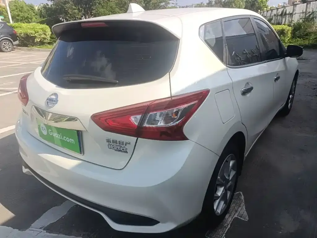 Nissan Tiida — фото 10
