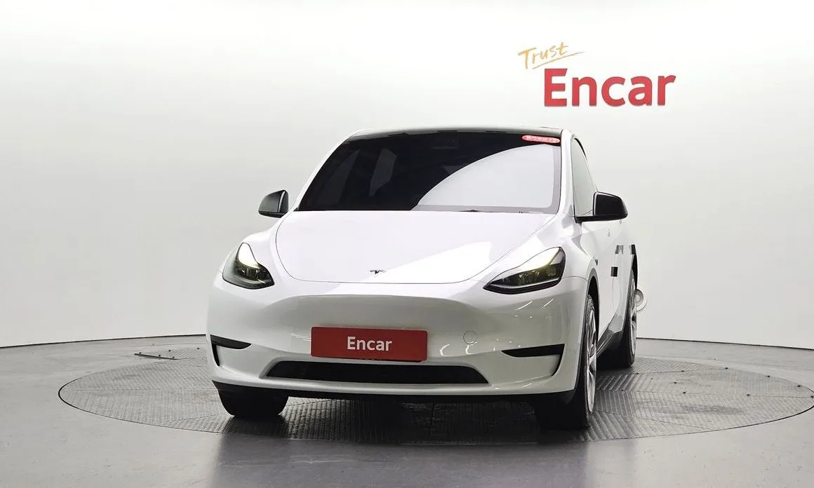 Tesla Model Y — фото 10