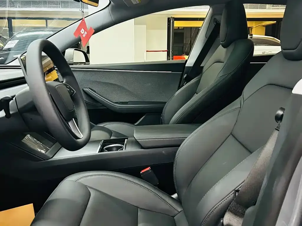 Tesla Model 3 — фото 7