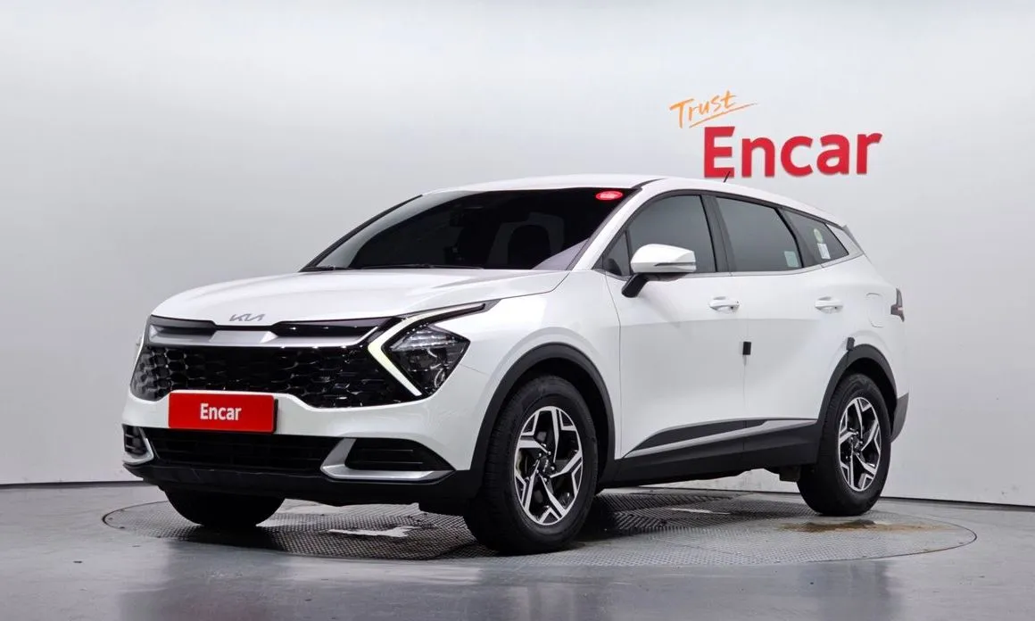 Kia Sportage — фото 1