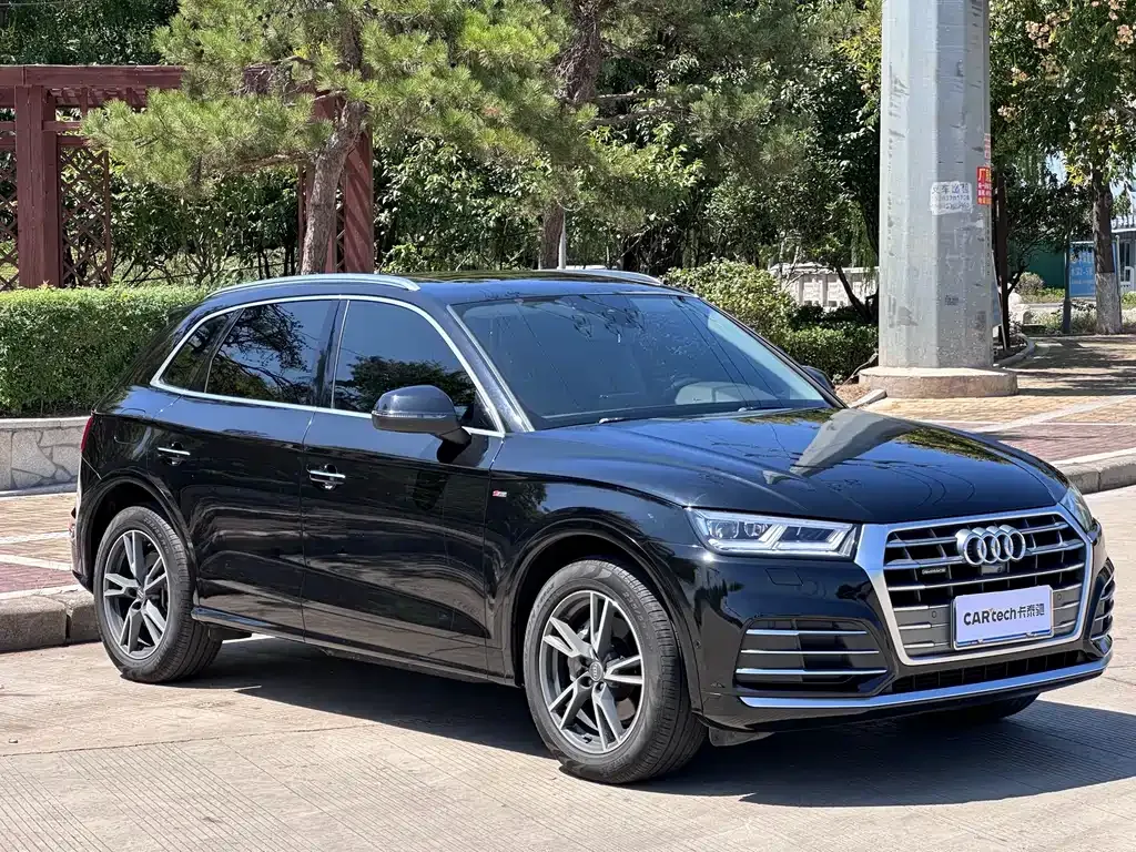 Audi Q5L — фото 7