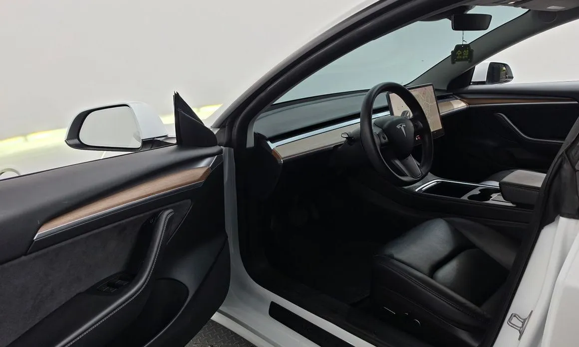 Tesla Model 3 — фото 8