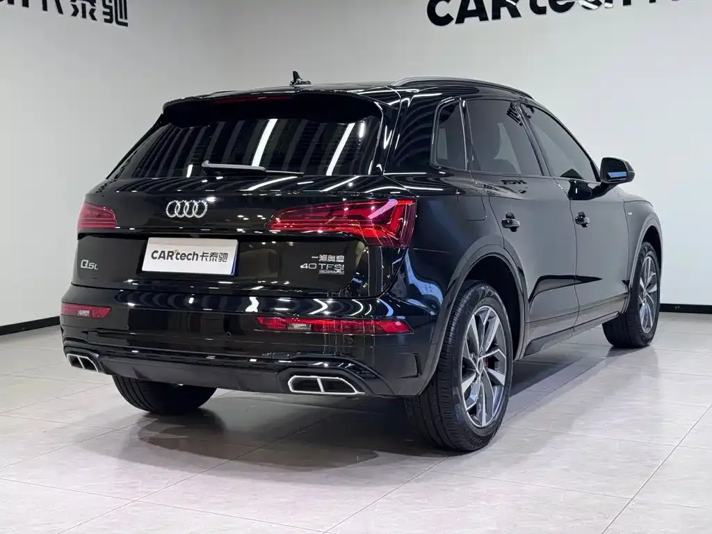 Audi Q5L — фото 10