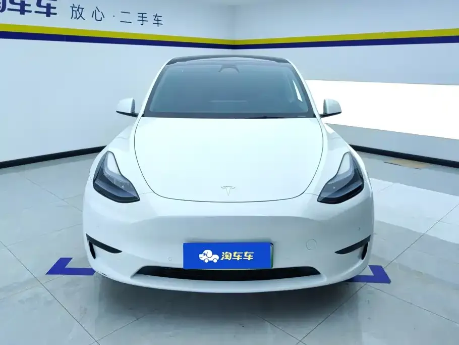 Tesla Model Y — фото 6