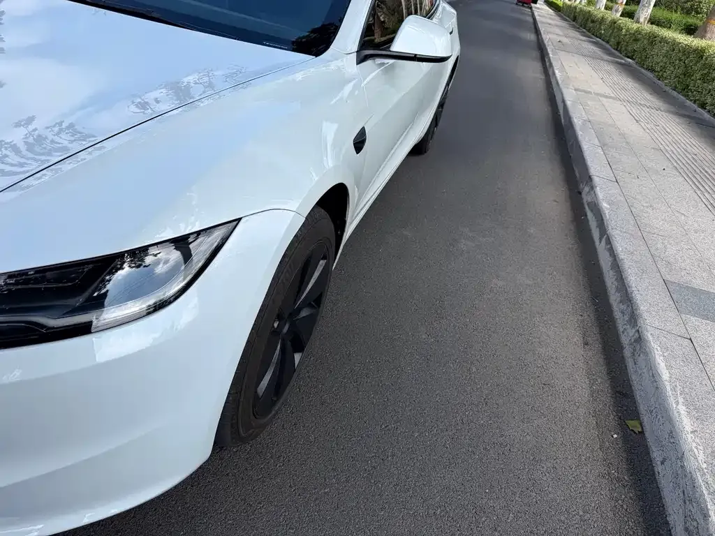 Tesla Model 3 — фото 3
