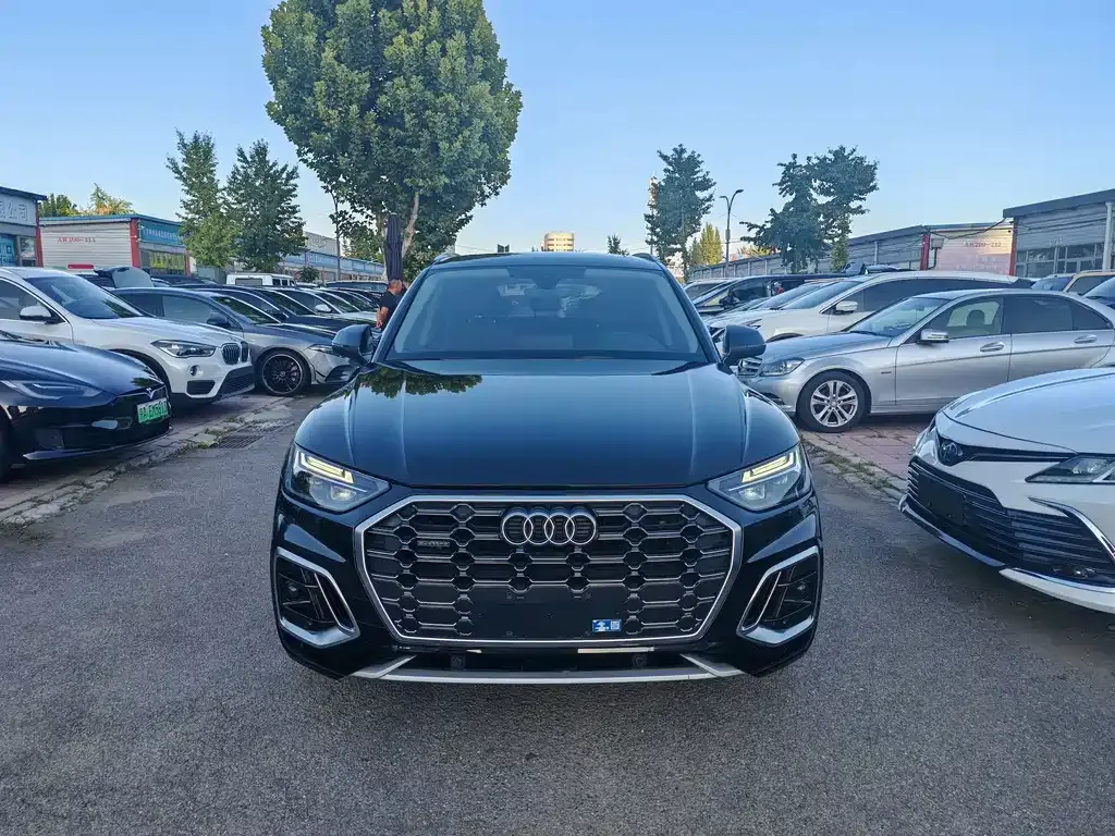 Audi Q5L — фото 10