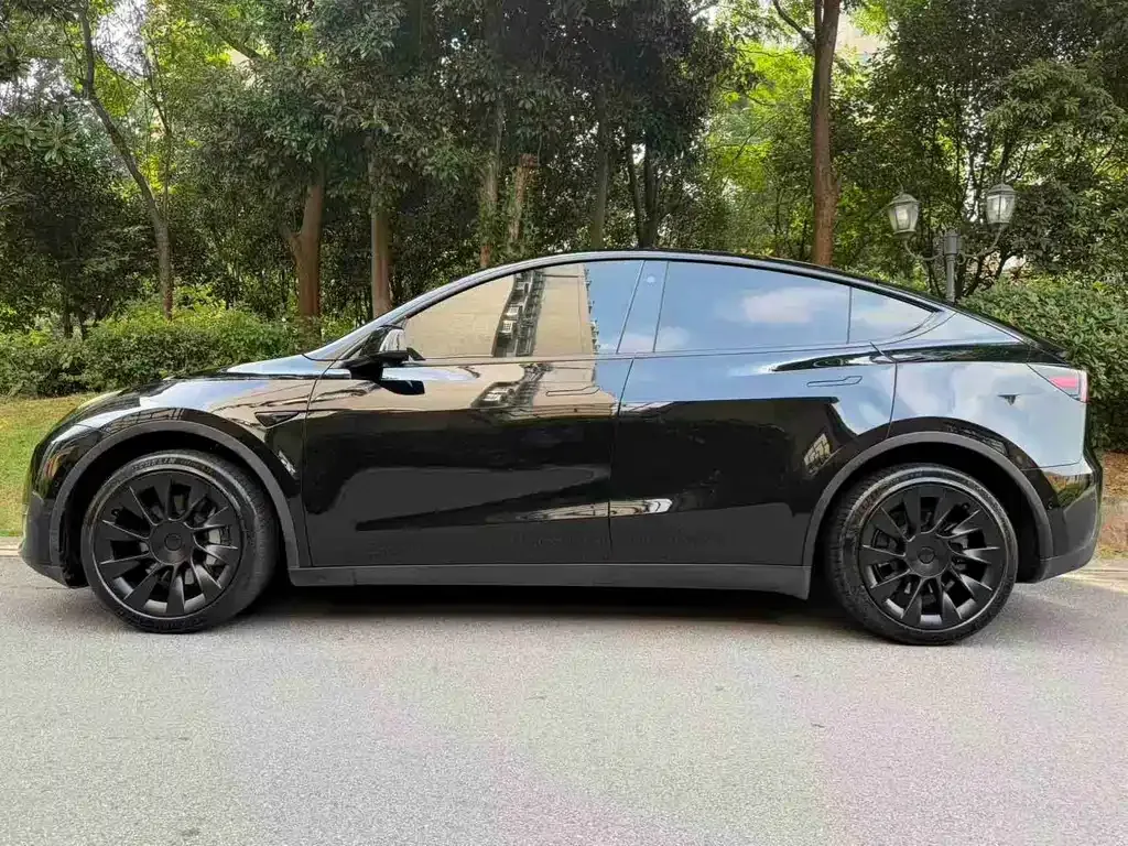 Tesla Model Y — фото 7