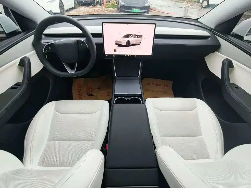 Tesla Model Y — фото 7
