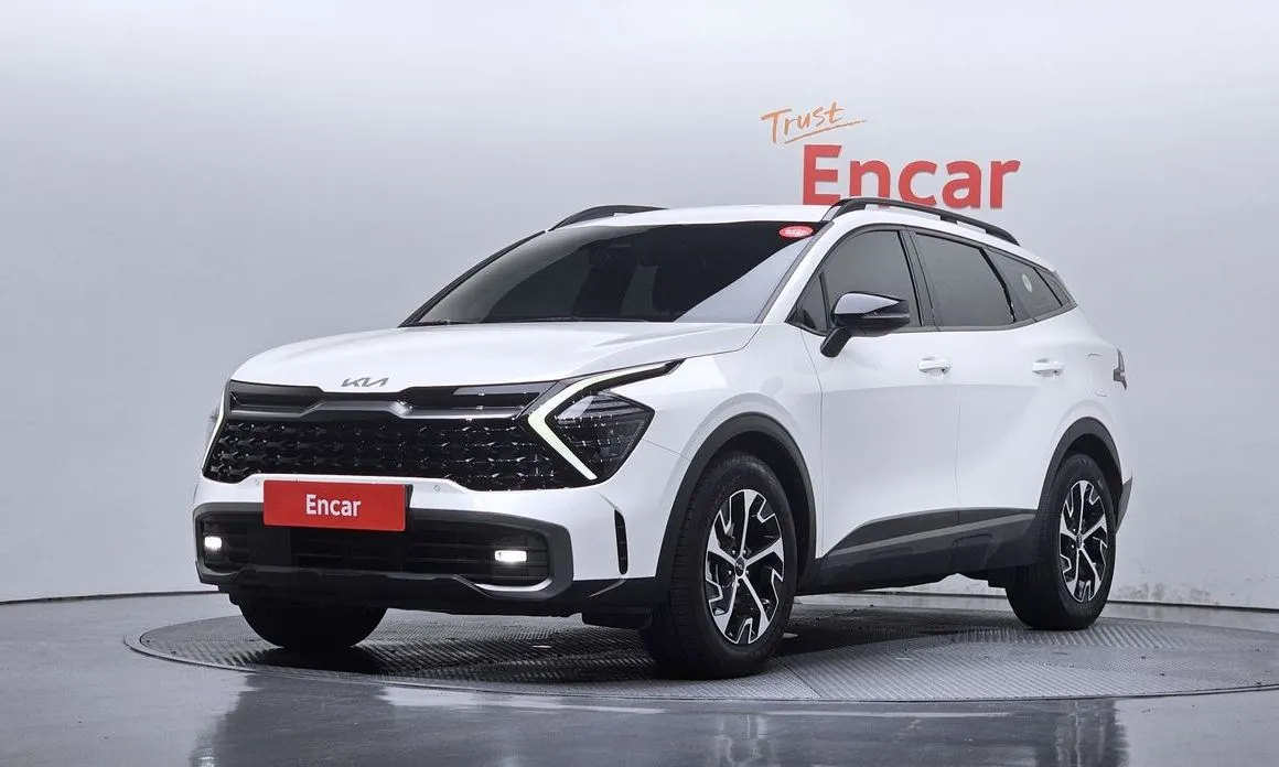 Kia Sportage — фото 1