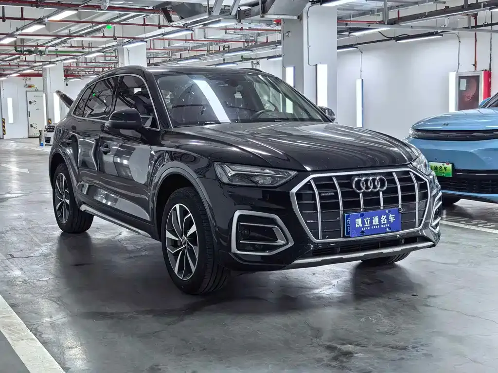 Audi Q5L — фото 6