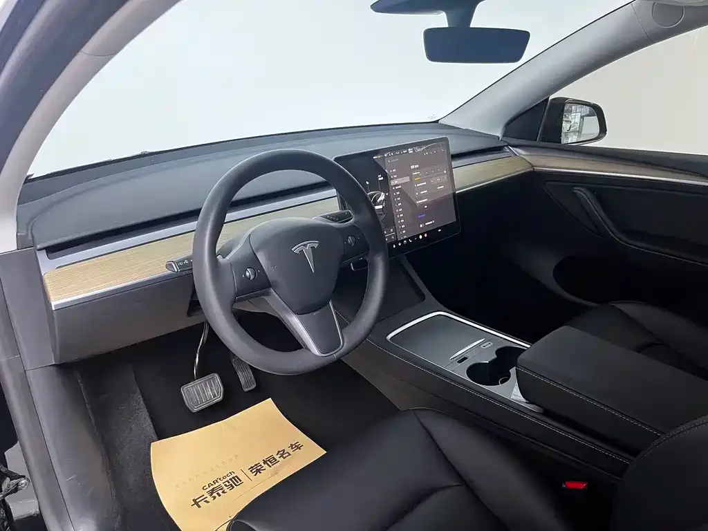 Tesla Model Y — фото 7