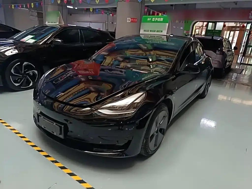 Tesla Model 3 — фото 6
