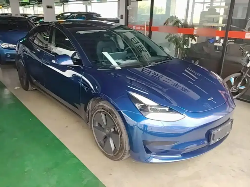 Tesla Model 3 — фото 10