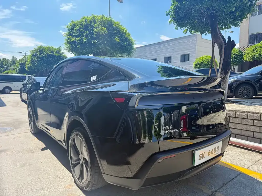 Tesla Model Y — фото 7
