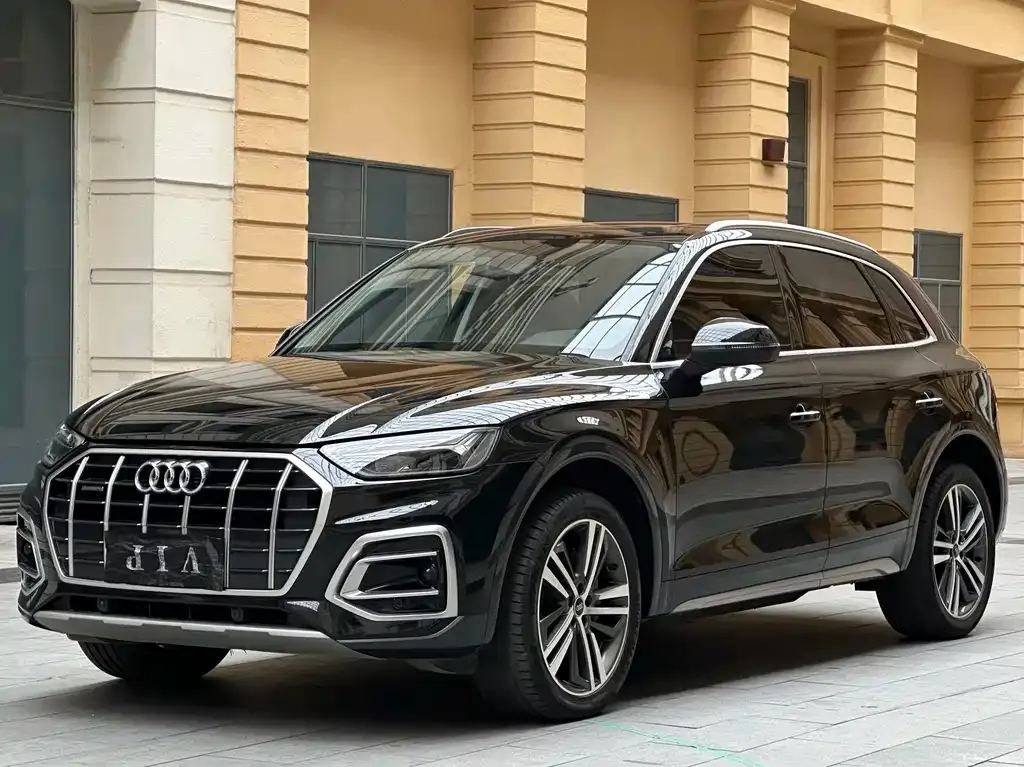 Audi Q5L — фото 8