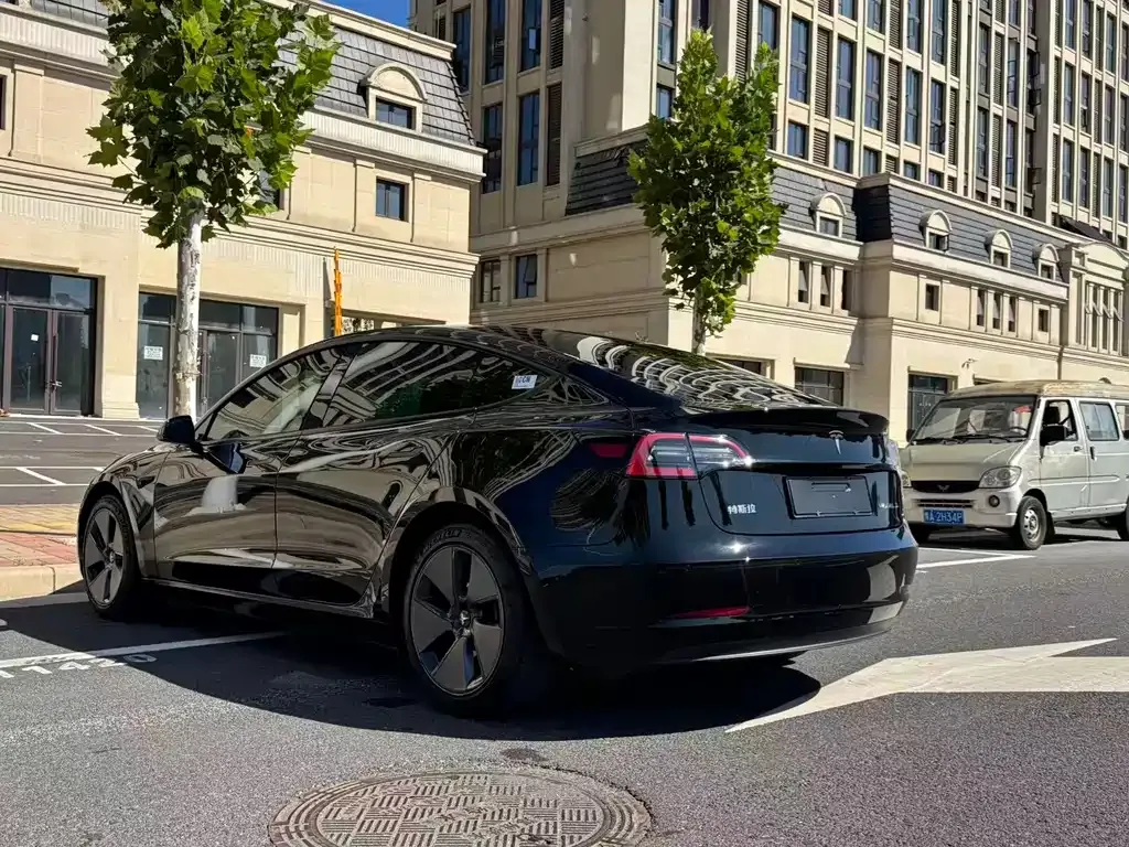 Tesla Model 3 — фото 7