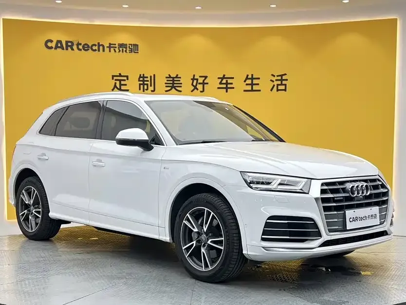 Audi Q5L — фото 9