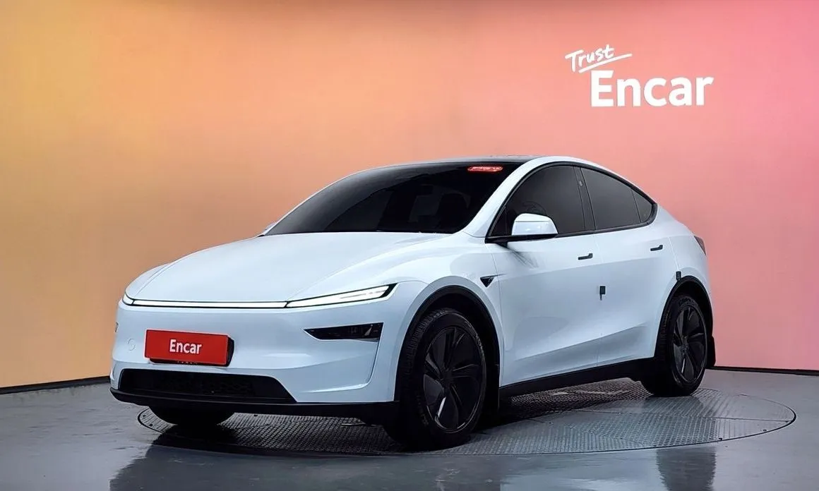 Tesla Model Y — фото 1