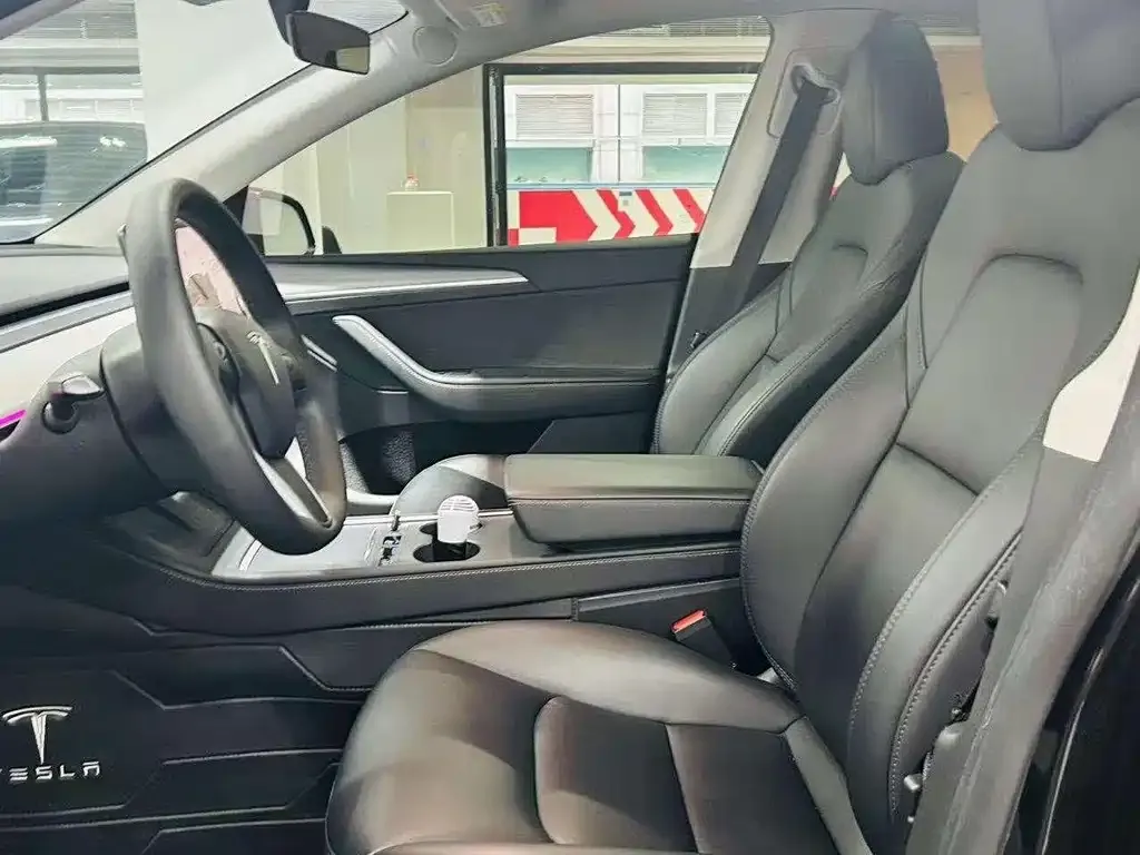 Tesla Model Y — фото 7