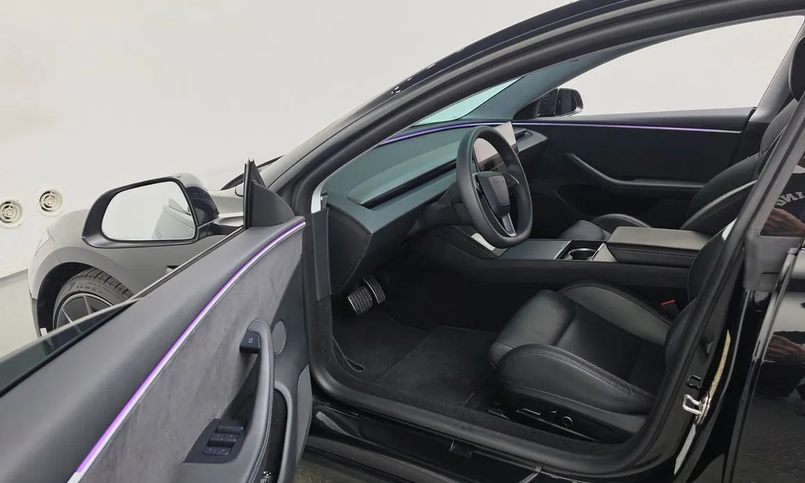 Tesla Model 3 — фото 10