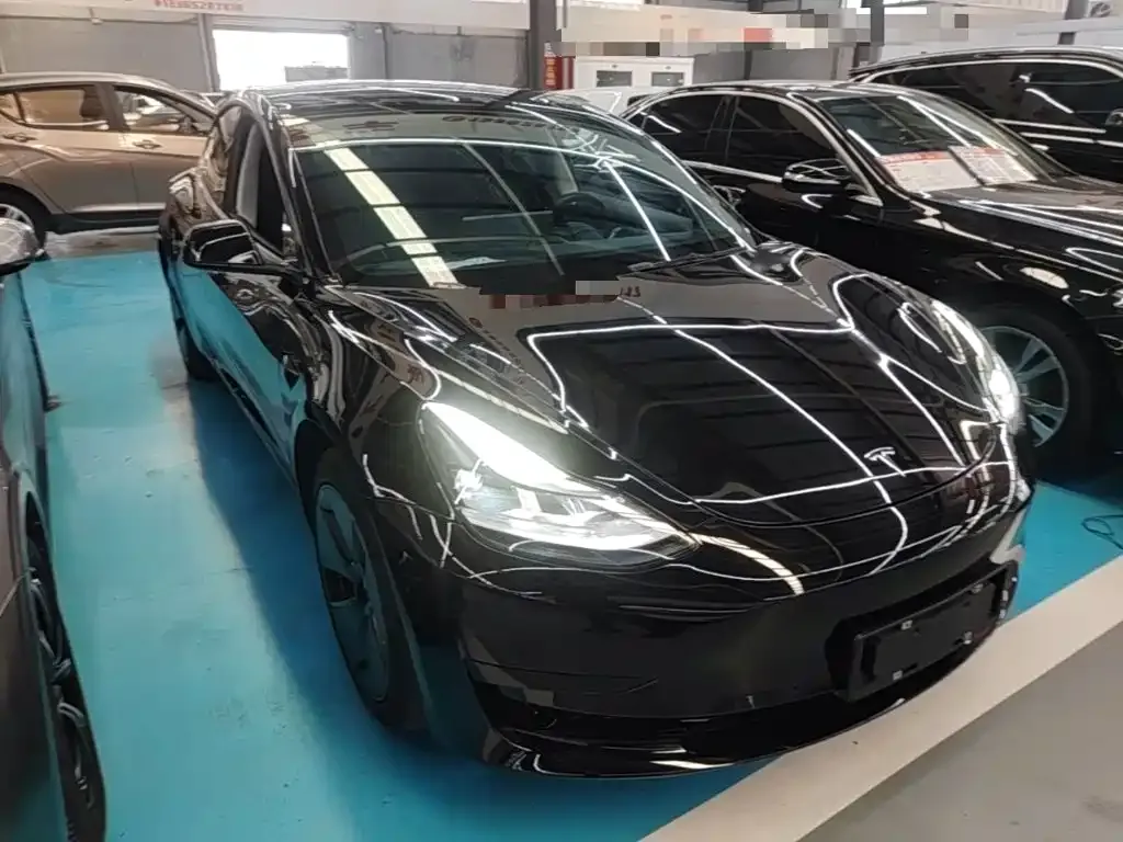 Tesla Model 3 — фото 9