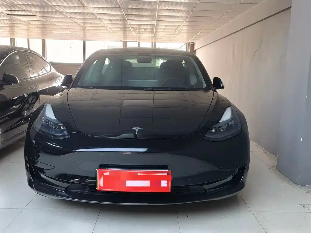 Tesla Model 3 — фото 10