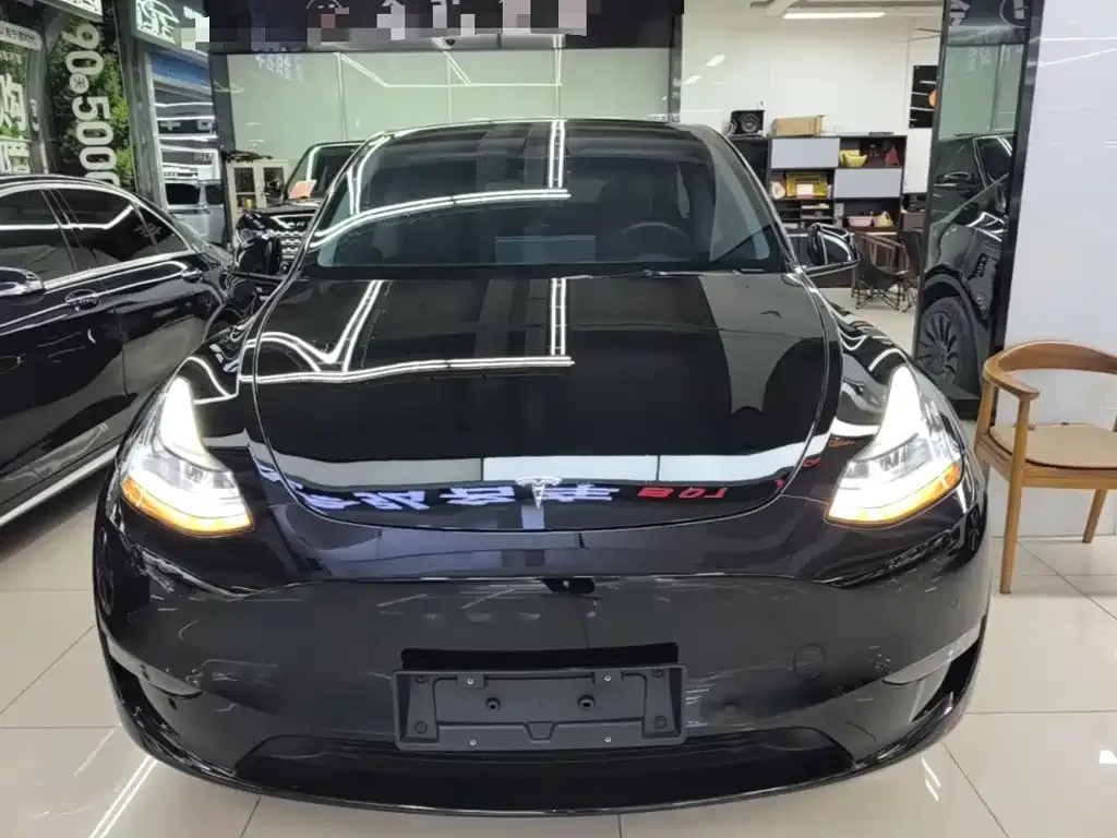 Tesla Model Y — фото 4