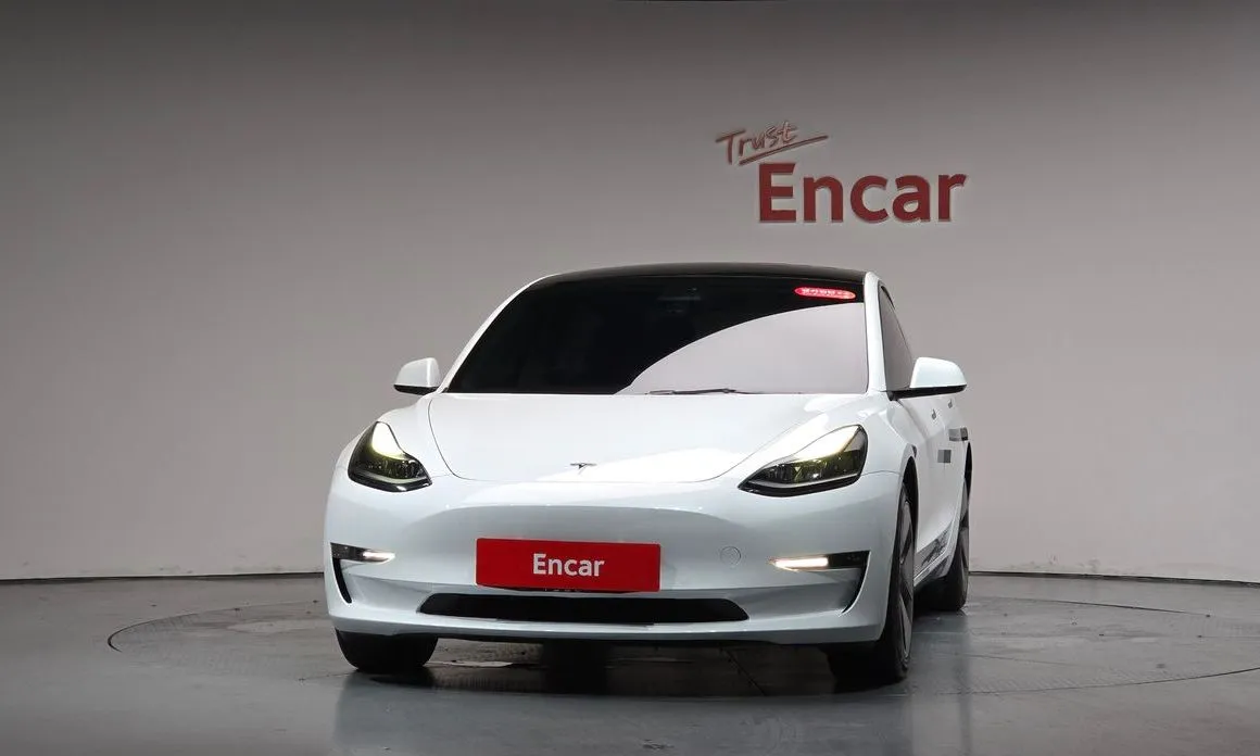 Tesla Model 3 — фото 9
