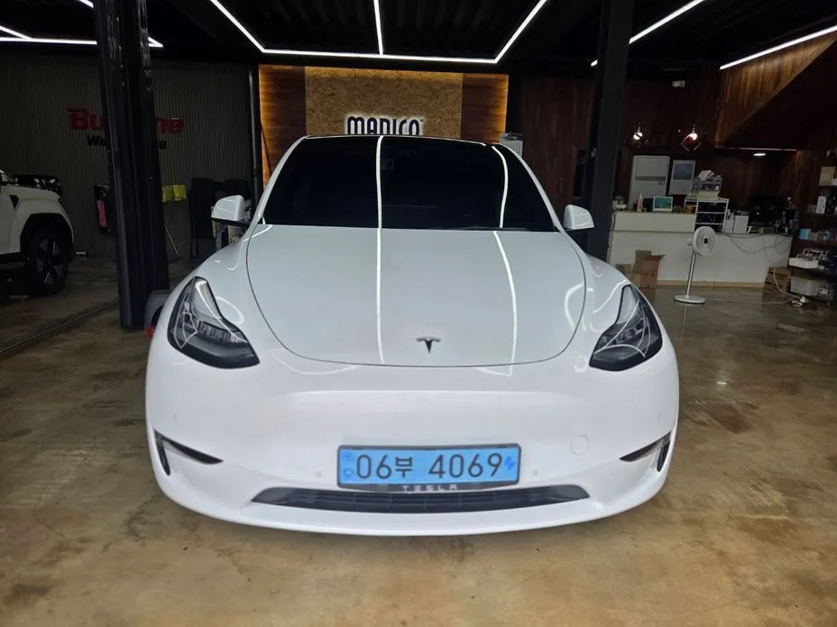 Tesla Model Y — фото 1