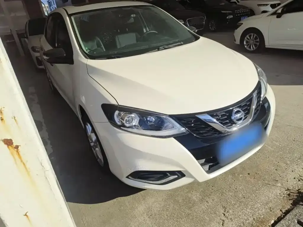 Nissan Tiida — фото 10