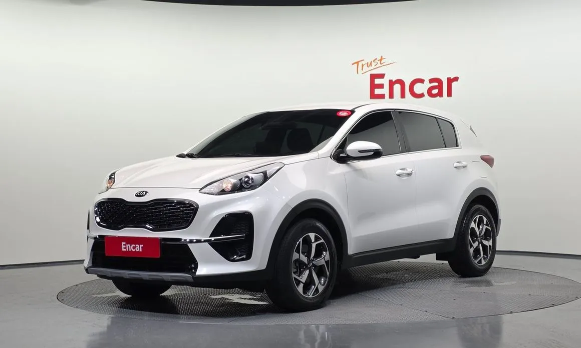 Kia Sportage — фото 1