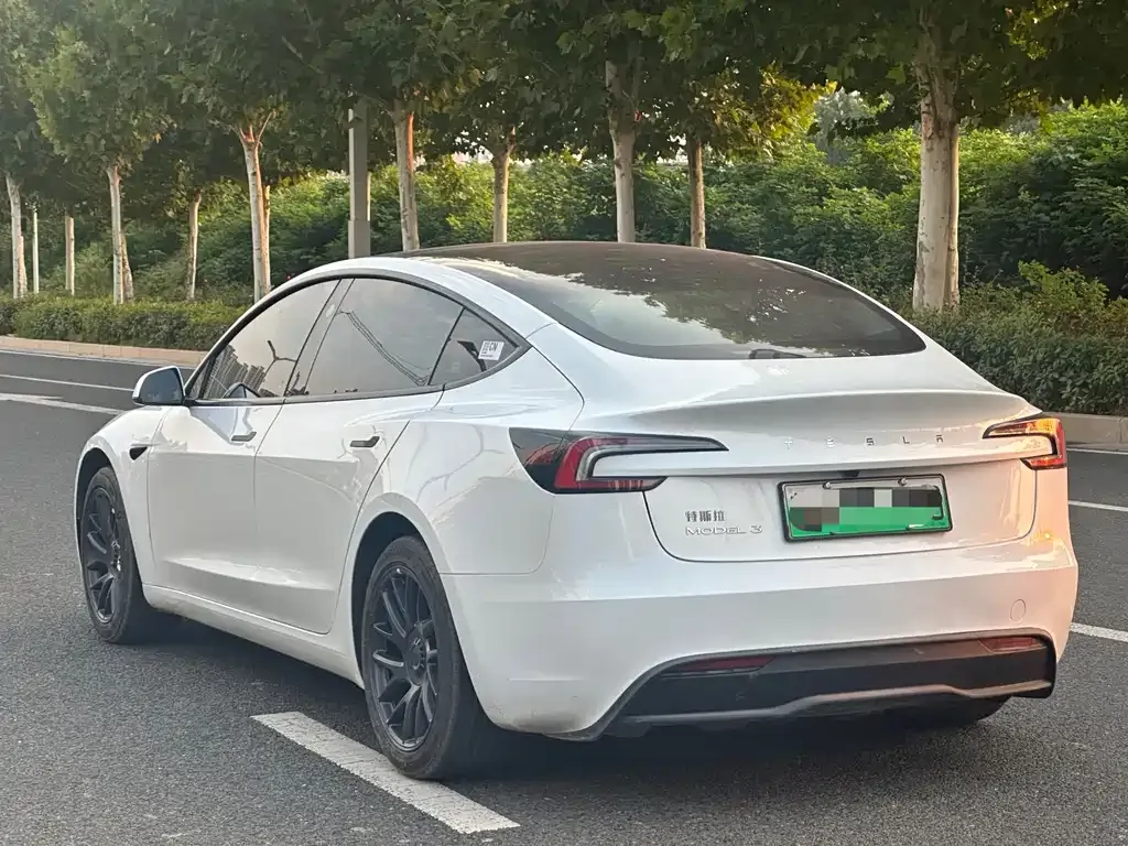 Tesla Model 3 — фото 10
