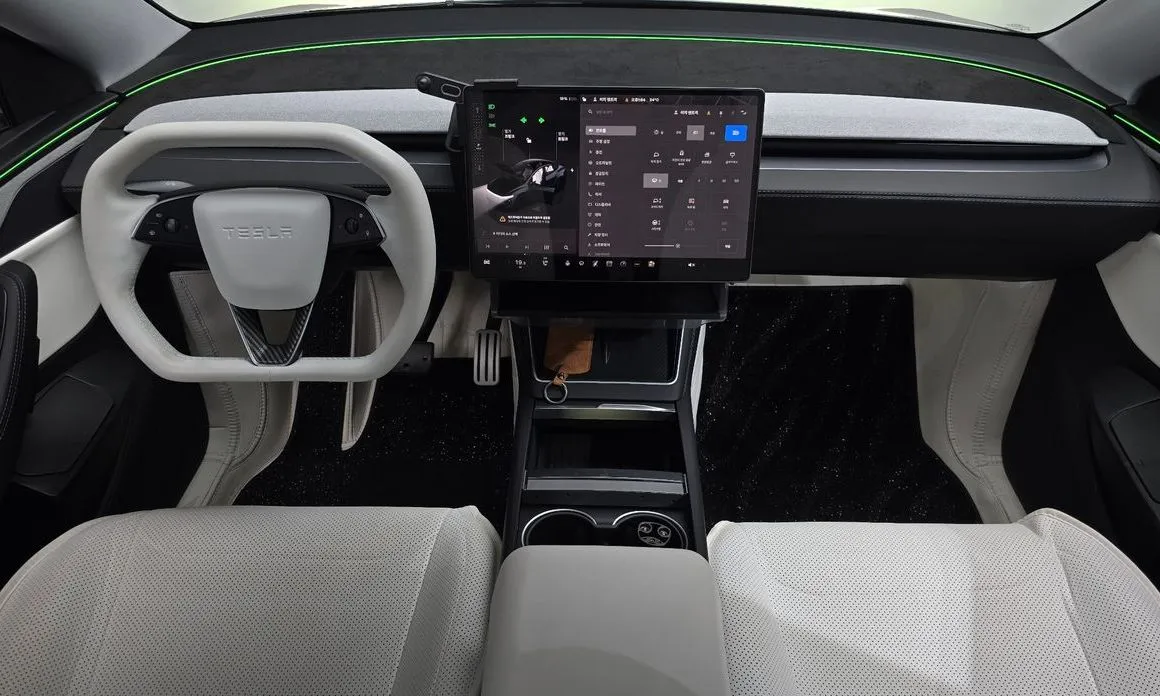 Tesla Model Y — фото 10