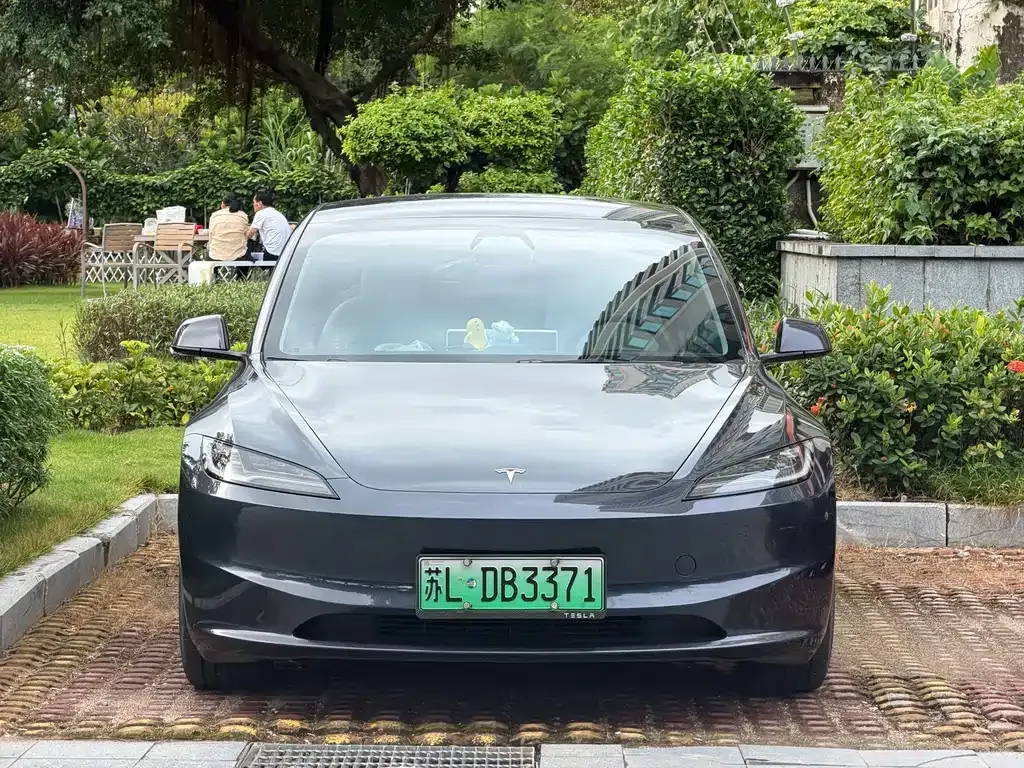 Tesla Model 3 — фото 7