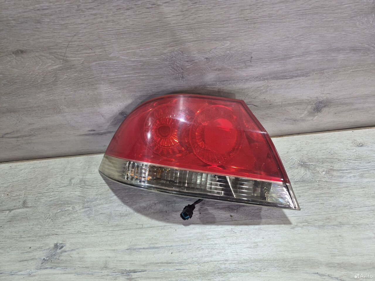 Фонарь левый Mitsubishi Lancer 9