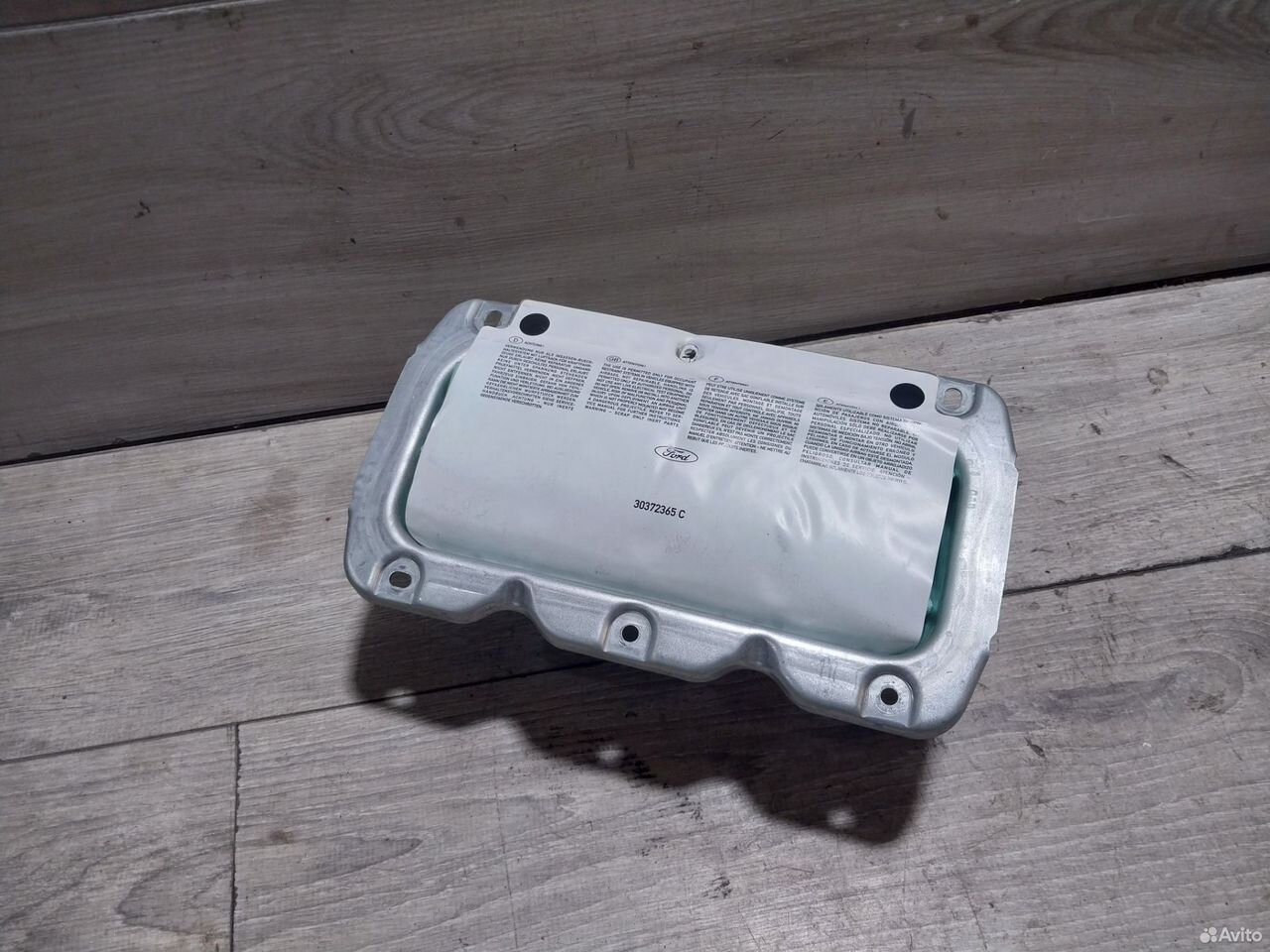 Подушка безопасности в торпеду Ford Fusion