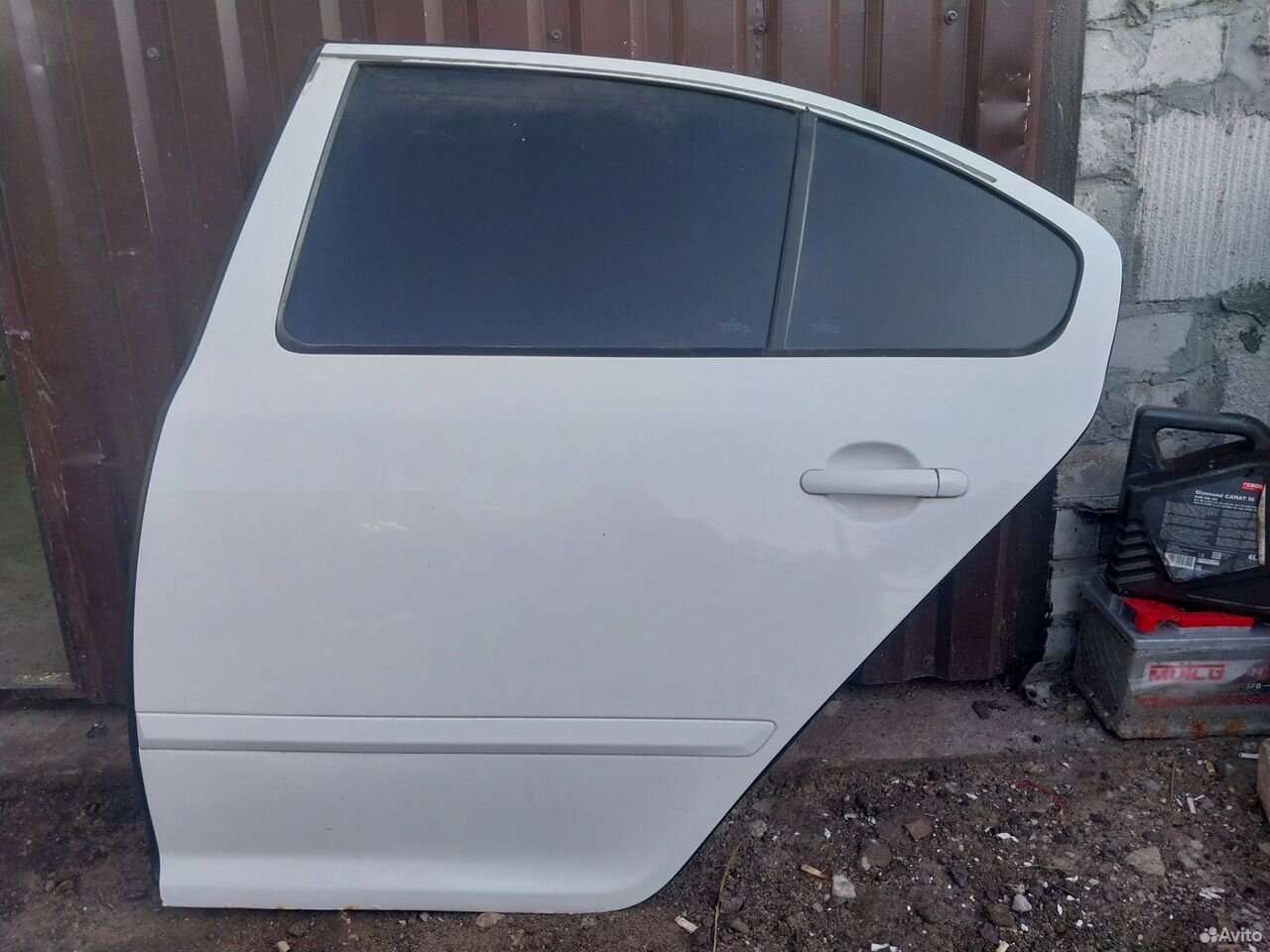 Дверь задняя левая Skoda Octavia A5