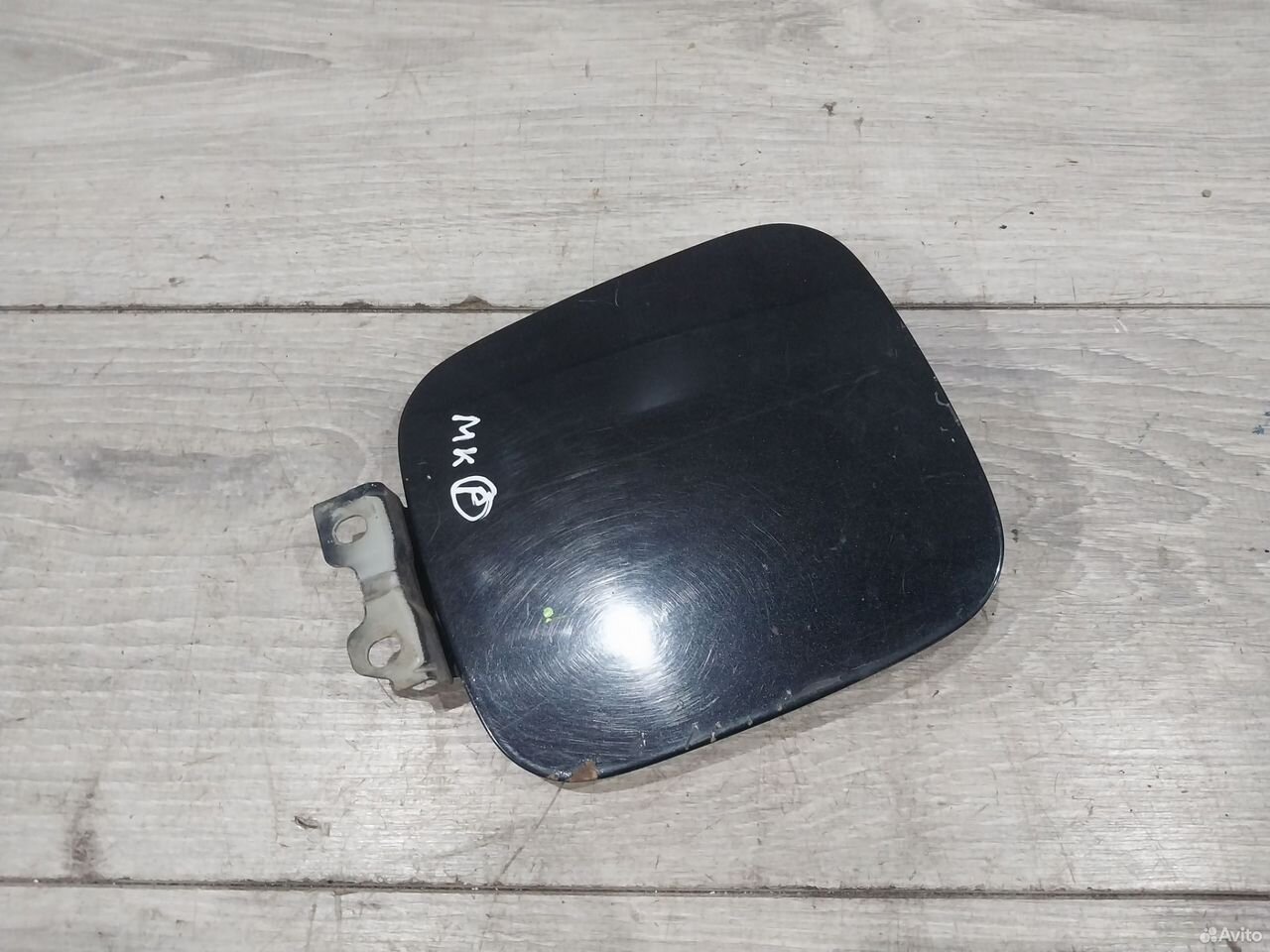 Лючок бензобака Mitsubishi Carisma