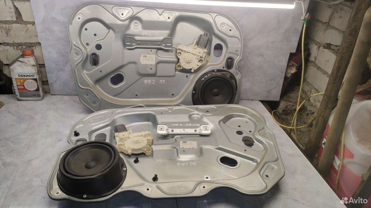 Стеклоподьемник передний Ford Focus 2
