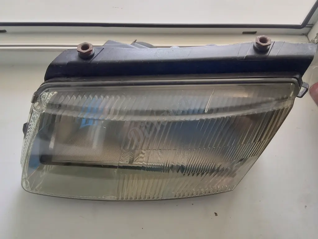 Фара Volkswagen Passat b5