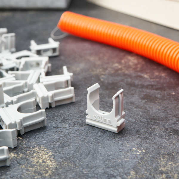 Крепеж-клипса для трубы ø20мм серая (10 шт/уп) REXANT