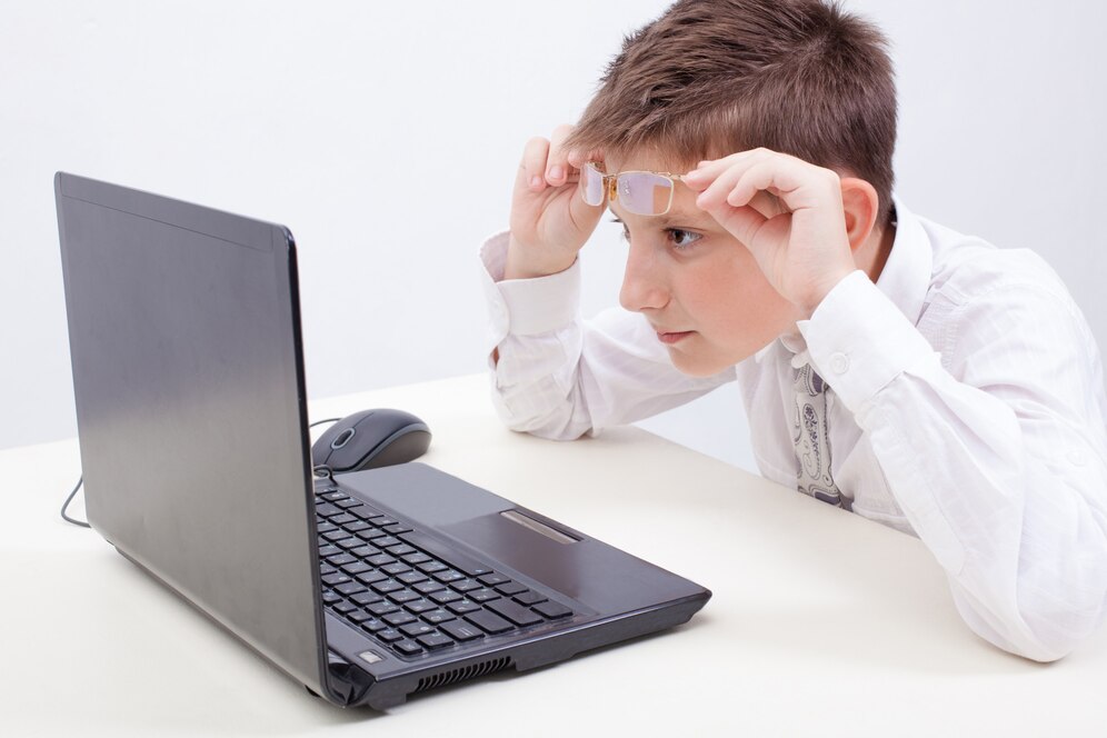 boy-using-his-laptop-computer_155003-14282.jpg