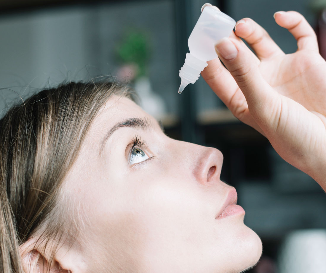 close-up-woman-putting-eye-drops.jpg