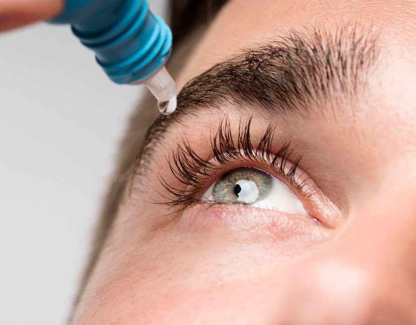 handsome-man-using-eye-drops-close-up_23-2148696715.jpg