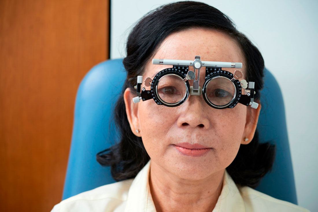 mature-asian-lady-wearing-trial-lens-frame-eyesight-examination.jpg