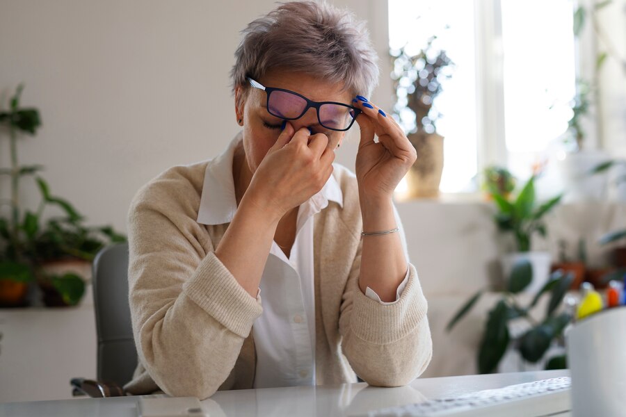 medium-shot-woman-sitting-desk_23-2150442248.jpg